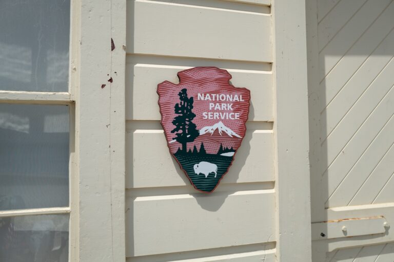 Close-up of carved logo for National Park Service. (Photo by Smith Collection/Getty Images)