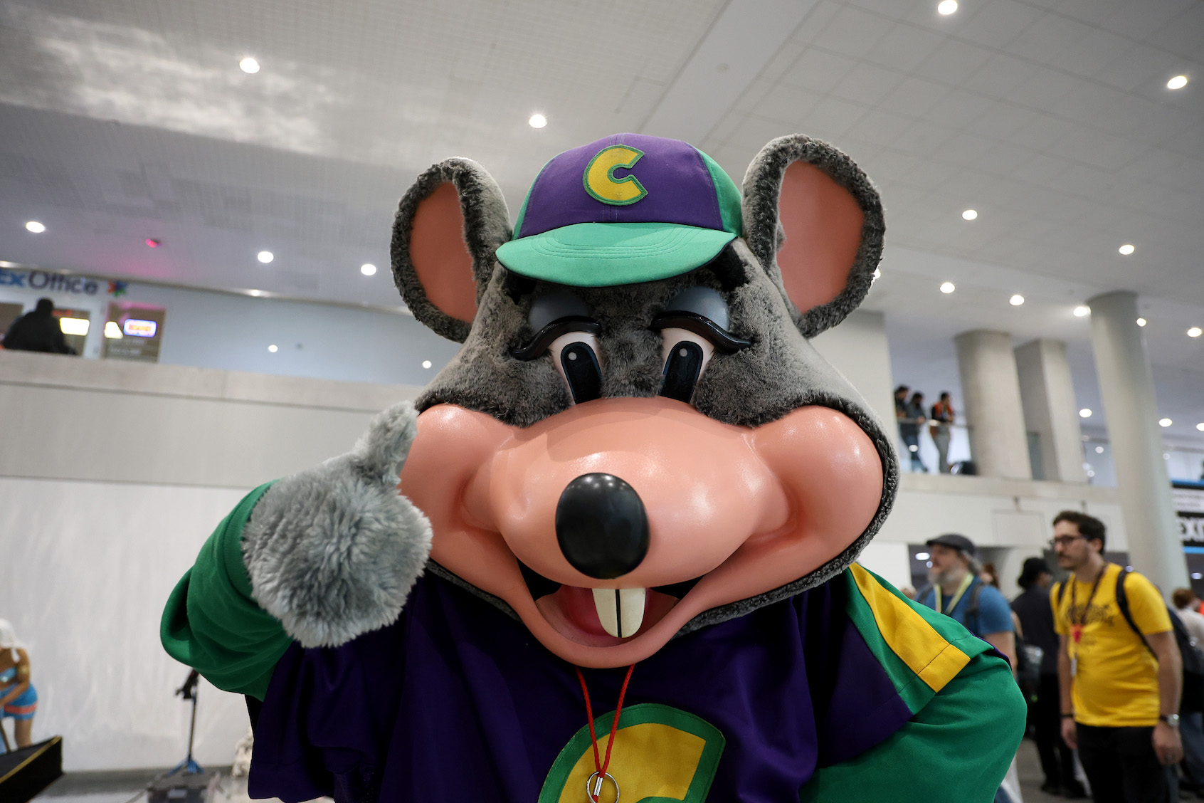 A cosplayer dressed as Chuck E. Cheese poses during the 2024 New York Comic Con. (Photo by Marleen Moise/Getty Images)