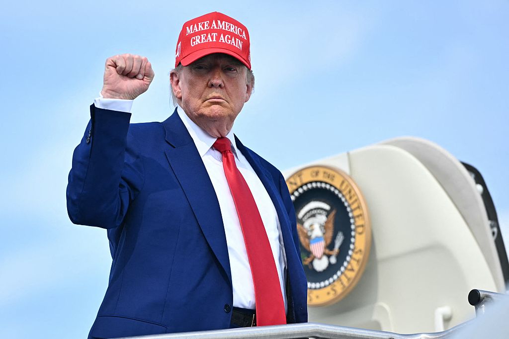 New poll says 3 of 4 Americans believe democracy is at risk and trust their political leaders even less. (MANDEL NGAN / AFP / Getty Images)