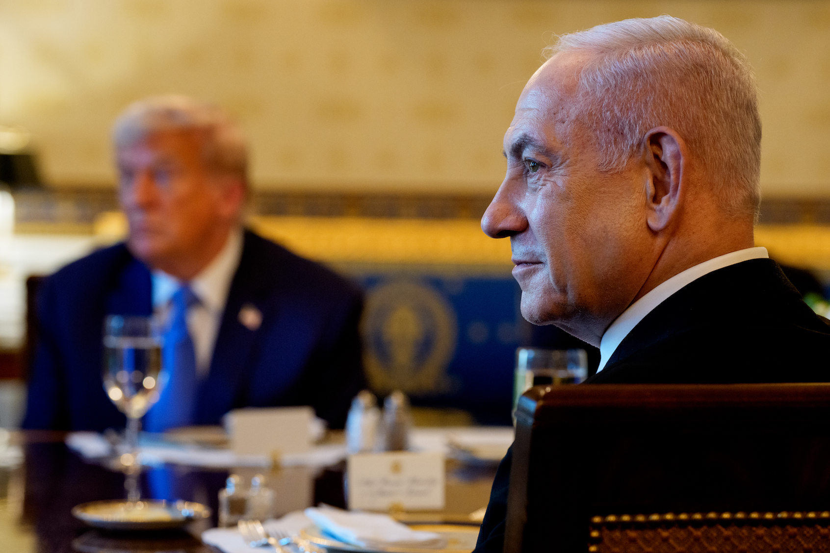 Donald Trump and Benjamin Netanyahu at dinner in the Blue Room of the White House, July 7, 2025. (Andrew Harnik/Getty Images)