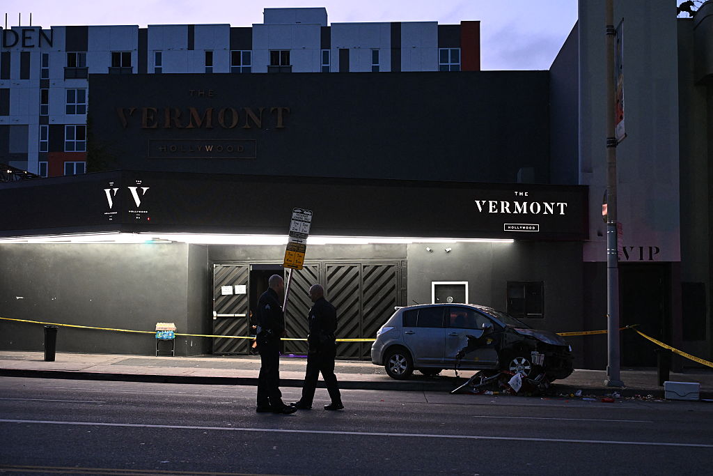 After a car plowed through a line outside an LA nightclub, injuring 30, bystanders shot and beat the driver before EMS arrived. (Robyn Beck / AFP / Getty Images)