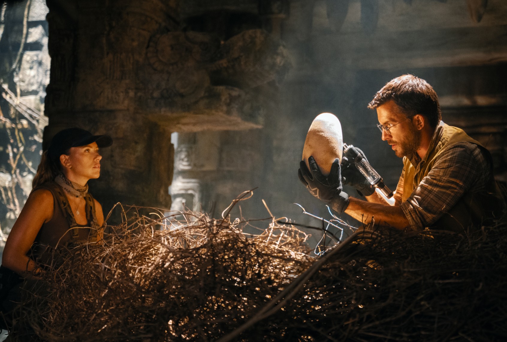 Jonathan Bailey as Dr. Henry Loomis and Scarlett Johansson as Zora Bennett in "Jurassic World Rebirth" (Jasin Boland/Universal Pictures and Amblin Entertainment)
