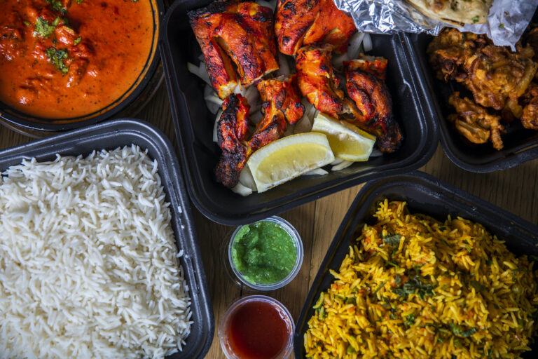 Indian takeout (adamkaz / Getty Images )