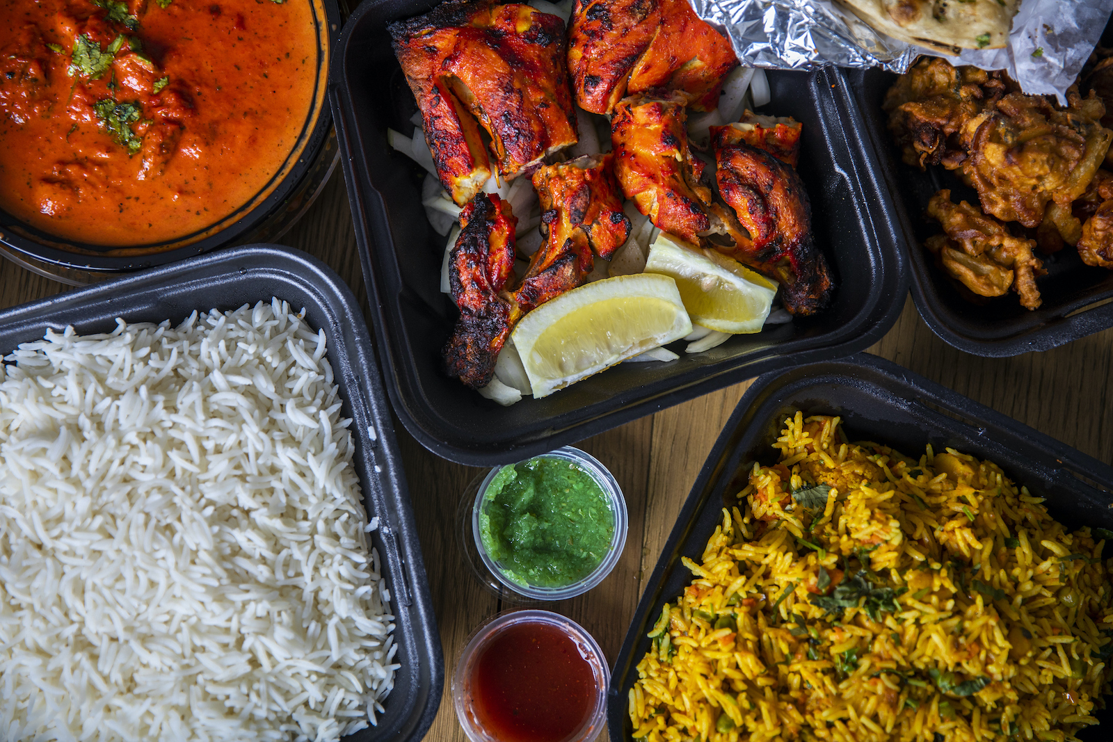 Indian takeout (adamkaz / Getty Images )