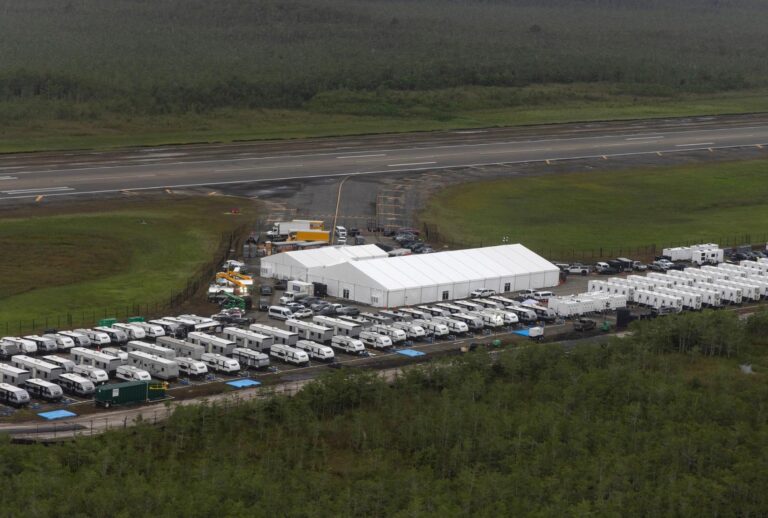 In an aerial view from a helicopter, the migrant detention center, dubbed "Alligator Alcatraz," is seen located at the site of the Dade-Collier Training and Transition Airport on July 4, 2025 in Ochopee, Florida. (Alon Skuy/Getty Images)