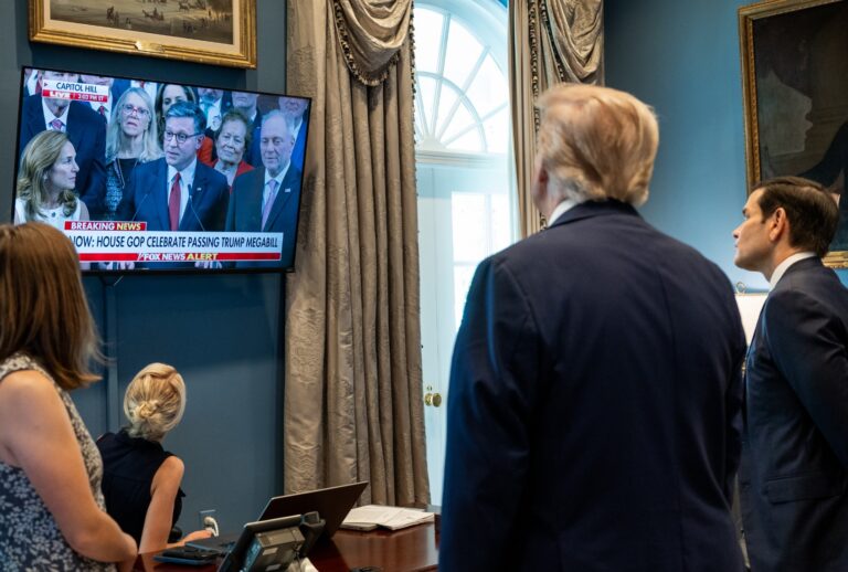 President Donald Trump and Secretary of State Marco Rubio (R) watch as House Speaker Mike Johnson (R-LA) announces the passing of H.R. 1, the One, Big, Beautiful Bill Act on July 3, 2025 in Washington, DC. (Joyce Boghosian/The White House via Getty Images)