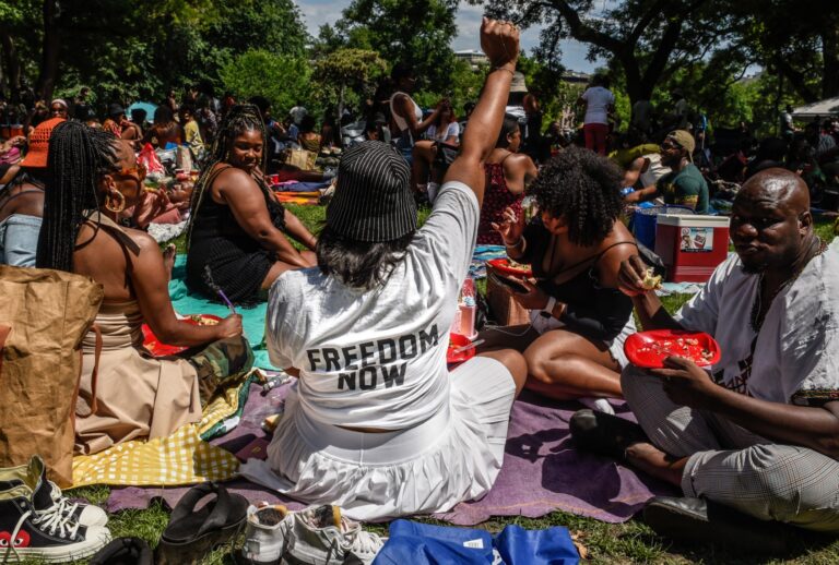 People participate in a Juneteenth celebration in Fort Greene park on June 18, 2023 in the Brooklyn borough of New York City. (Stephanie Keith/Getty Images)