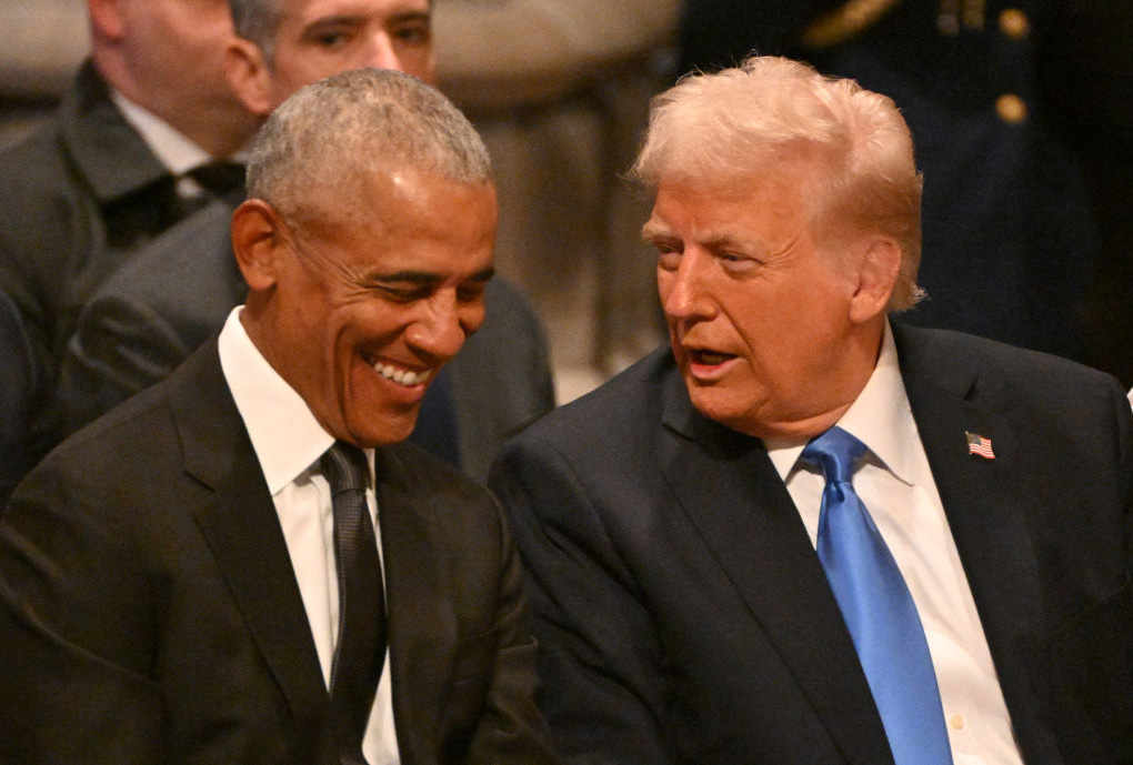 Former President Barack Obama speaks with President-elect Donald Trump before the state funeral for former President Jimmy Carter at the Washington National Cathedral on January 9, 2025. (ROBERTO SCHMIDT/AFP via Getty Images)