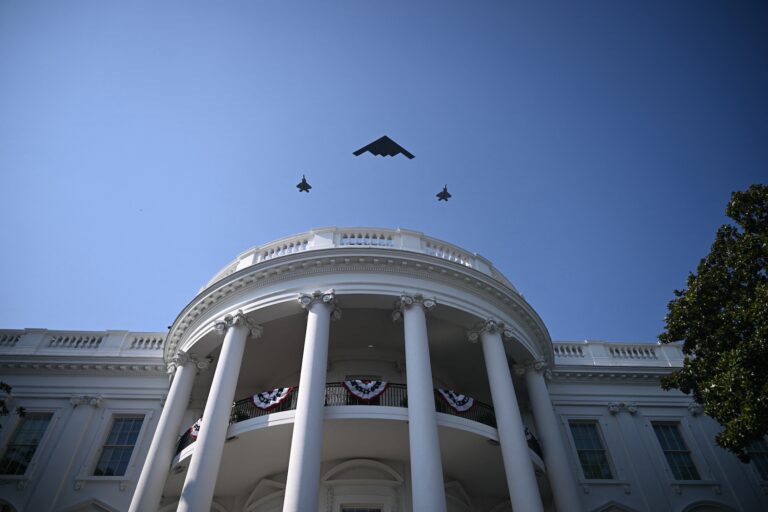 A B-2 Spirit stealth bomber escorted by 2 F-35 Lightning II stealth fighters fly over the White House as US president Donald Trump and First Lady Melania Trump participate in the Military Family Picnic on the South Lawn of the White House. ( (Photo by Brendan Smialowski/Getty Images)