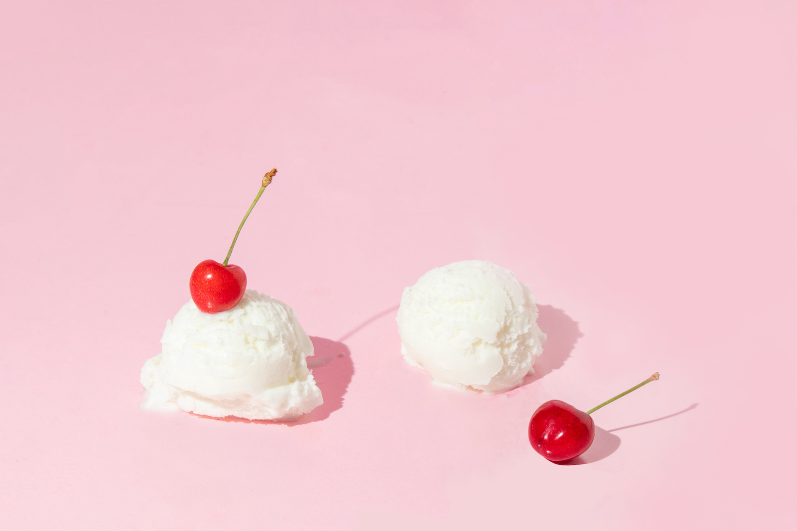 Ice cream scoops and bright red cherries (Adela Belovodjanin / Getty Images)