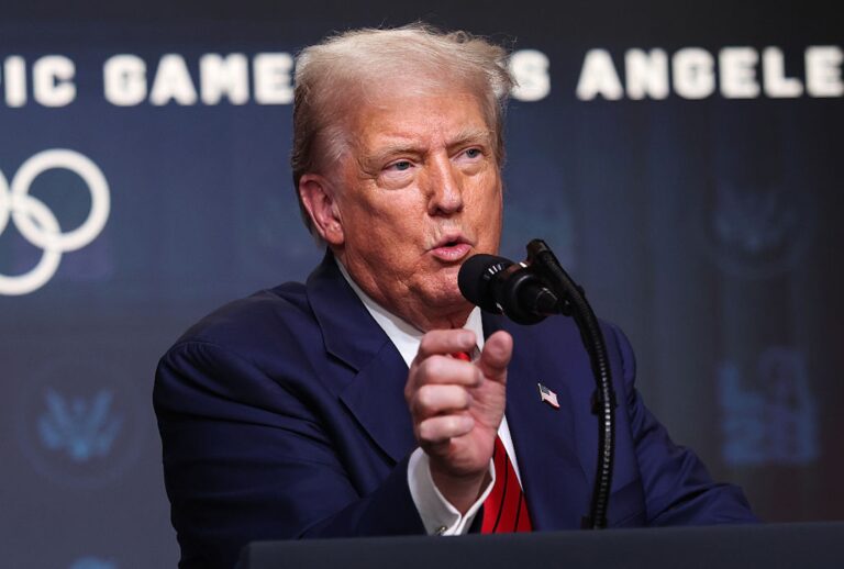 President Donald Trump speaks to reporters after signing an executive order creating a White House task force to help coordinate logistical issues related to the 2028 Summer Olympic Games in Los Angeles. (Win McNamee/Getty Images)