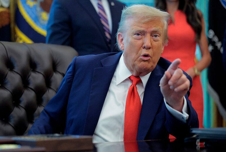 President Donald Trump talks to journalists after signing executive orders in the Oval Office on Aug. 25, 2025. (Chip Somodevilla/Getty Images)