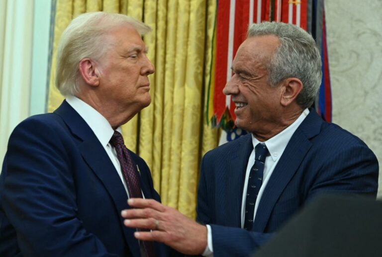 Secretary of Health and Human Services Robert F. Kennedy Jr. shakes hands with President Donald Trump at the White House on Feb. 13, 2025. (Andrew Caballero-Reynolds/AFP via Getty Images))