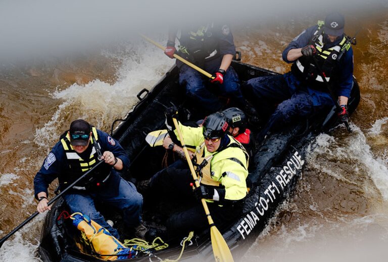 The FEMA Colorado Task Force 1 navigates the Guadalupe River as they search for flooding victims in Center Point, Texas. (Brenda Bazán / The Washington Post via Getty Images)