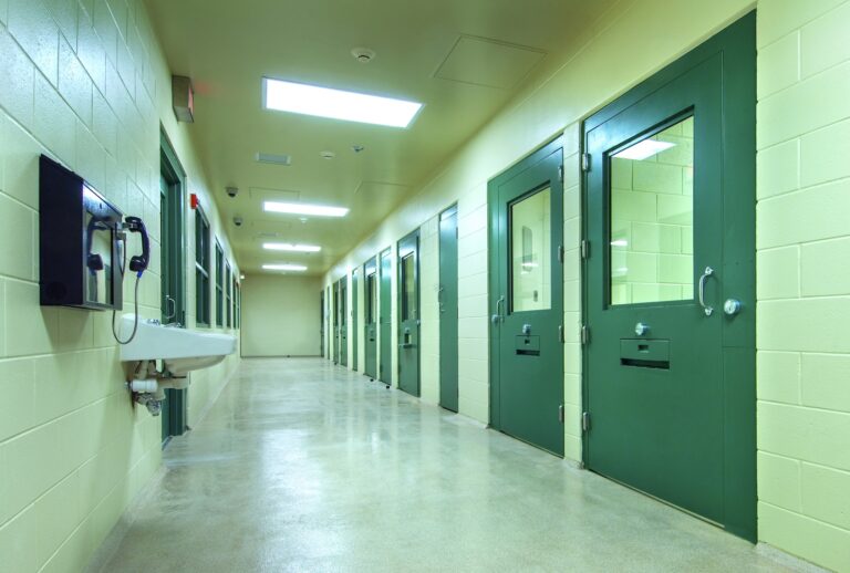 A Florida prison corridor is lined with jail cells (Getty Images)