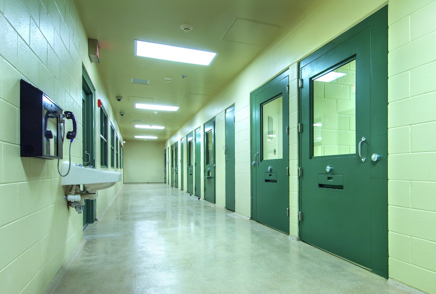 A Florida prison corridor is lined with jail cells (Getty Images)
