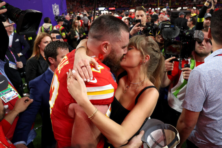 Travis Kelce #87 of the Kansas City Chiefs and Taylor Swift embrace after defeating the San Francisco 49ers in overtime during Super Bowl LVIII at Allegiant Stadium on February 11, 2024 in Las Vegas, Nevada. (Photo by Ezra Shaw/Getty Images)