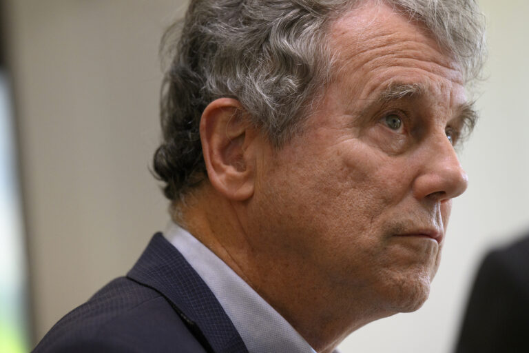 Sen. Sherrod Brown, D-Ohio, talks to a reporter during a campaign stop in Cleveland, Oct. 30, 2024. (Jeff Swensen/Getty Images)