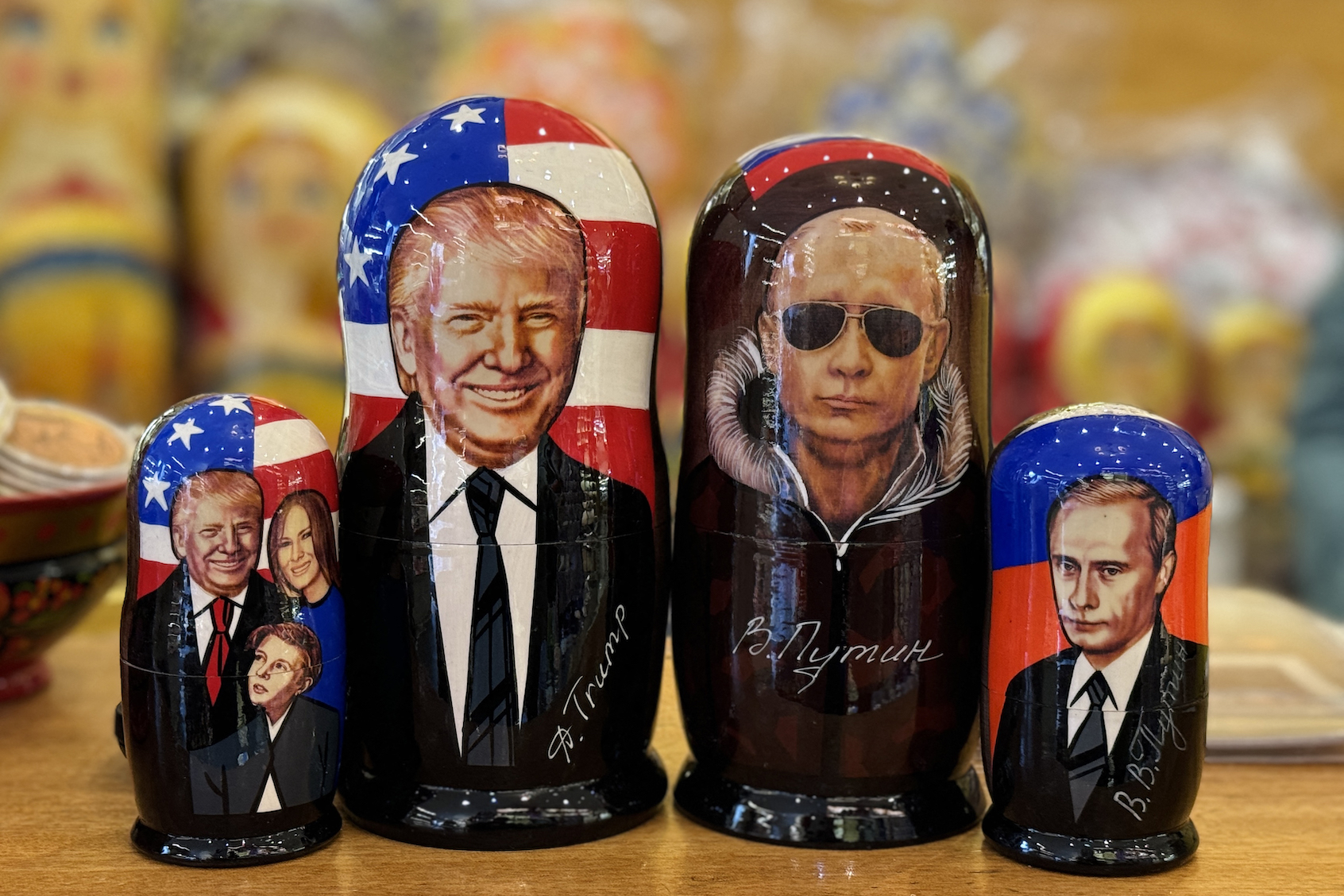 Traditional Russian wooden nesting dolls depicting Vladimir Putin and Donald Trump at a gift shop in Moscow. (Nikita Borissov/AFP via Getty Images)