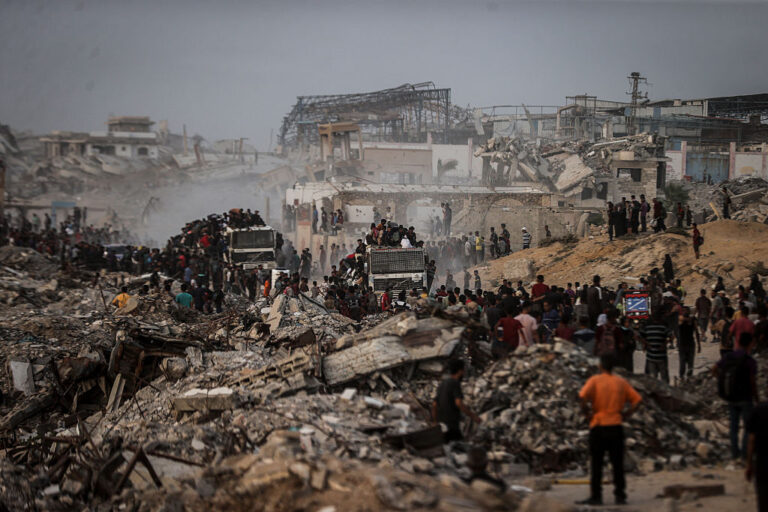 Relief trucks move into Gaza during Trump envoy’s visit, as aid workers say the crisis has hit a "worst‑case scenario." (Ali Jadallah / Anadolu / Getty Images)