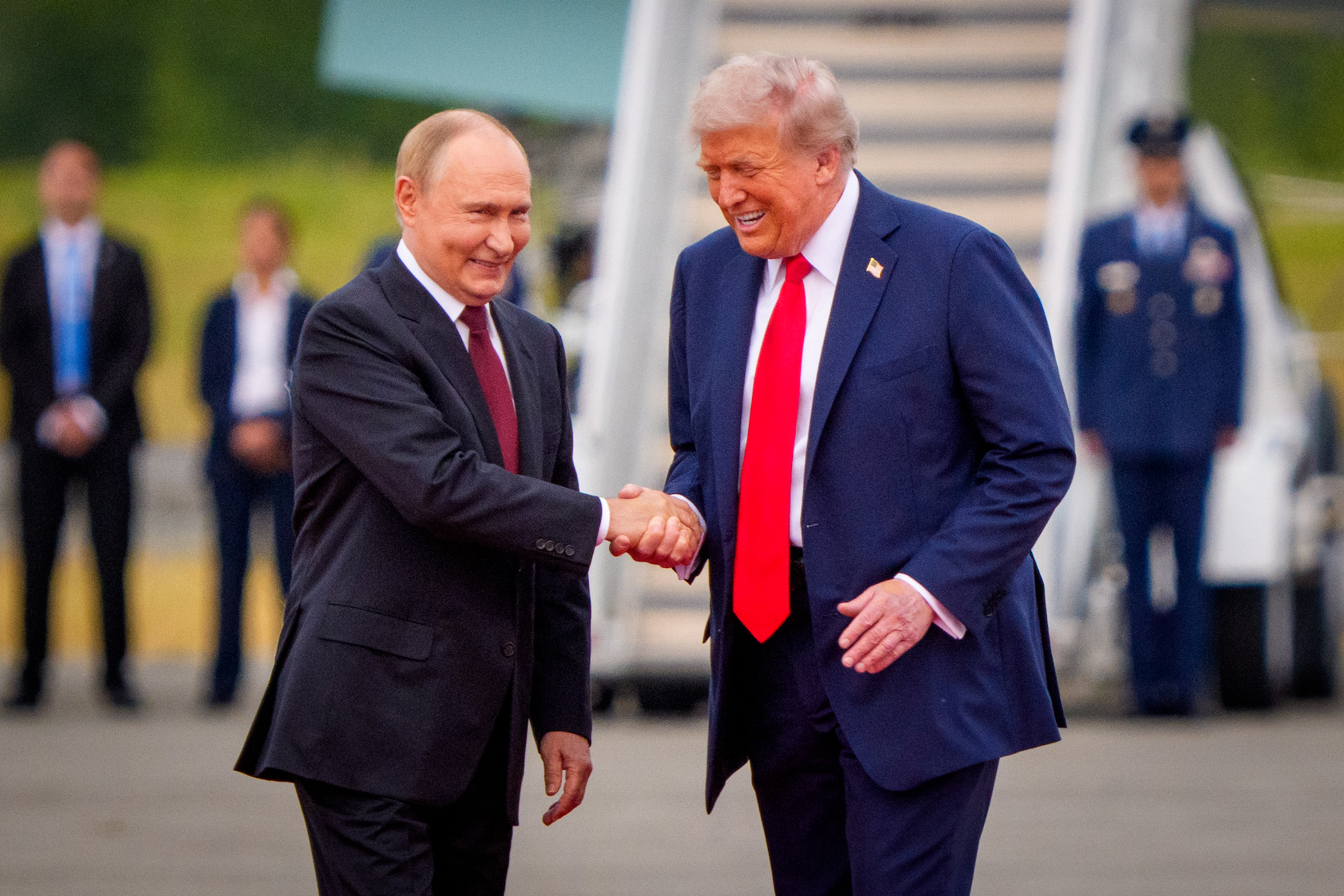 President Donald Trump greets Russian President Vladimir Putin as he arrives at Joint Base Elmendorf-Richardson in Anchorage, Alaska, Aug. 15, 2025. (Andrew Harnik/Getty Images)