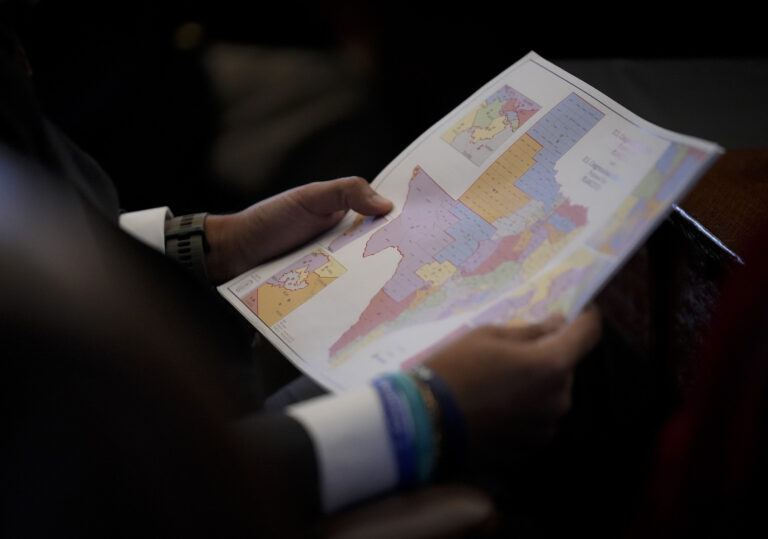 Rep. Marc LaHood, R-San Antonio, looks at a congressional redistricting map during debate of a congressional redistricting plan in the House Chamber at the Capitol in Austin. (Photo by Jay Janner/Getty Images)