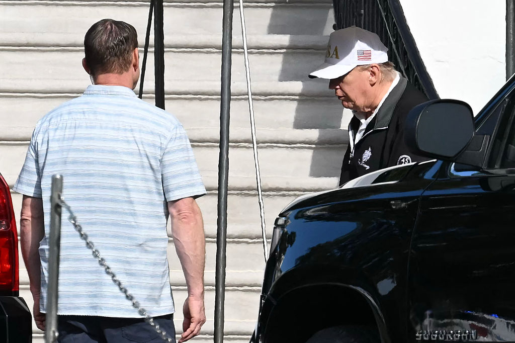 After a few days of online speculation, President Trump appears alive with family at a golf outing and online with rapid social media posts. (ANDREW CABALLERO-REYNOLDS / AFP / Getty Images)