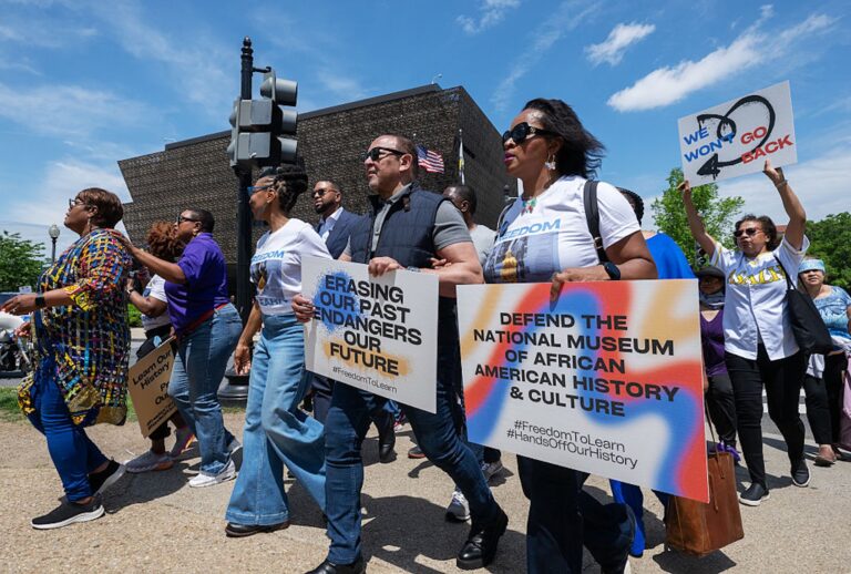 Demonstrators protest the Trump administration's executive actions aimed at the Smithsonian Institution march to the National Museum of African American History and Culture on May 3, 2025. (Craig Hudson For The Washington Post via Getty Images)