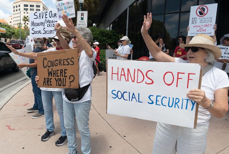 People gather in Miami  to protest social safety net cuts by the Trump administration. (Jesus Olarte/Anadolu via Getty Images)