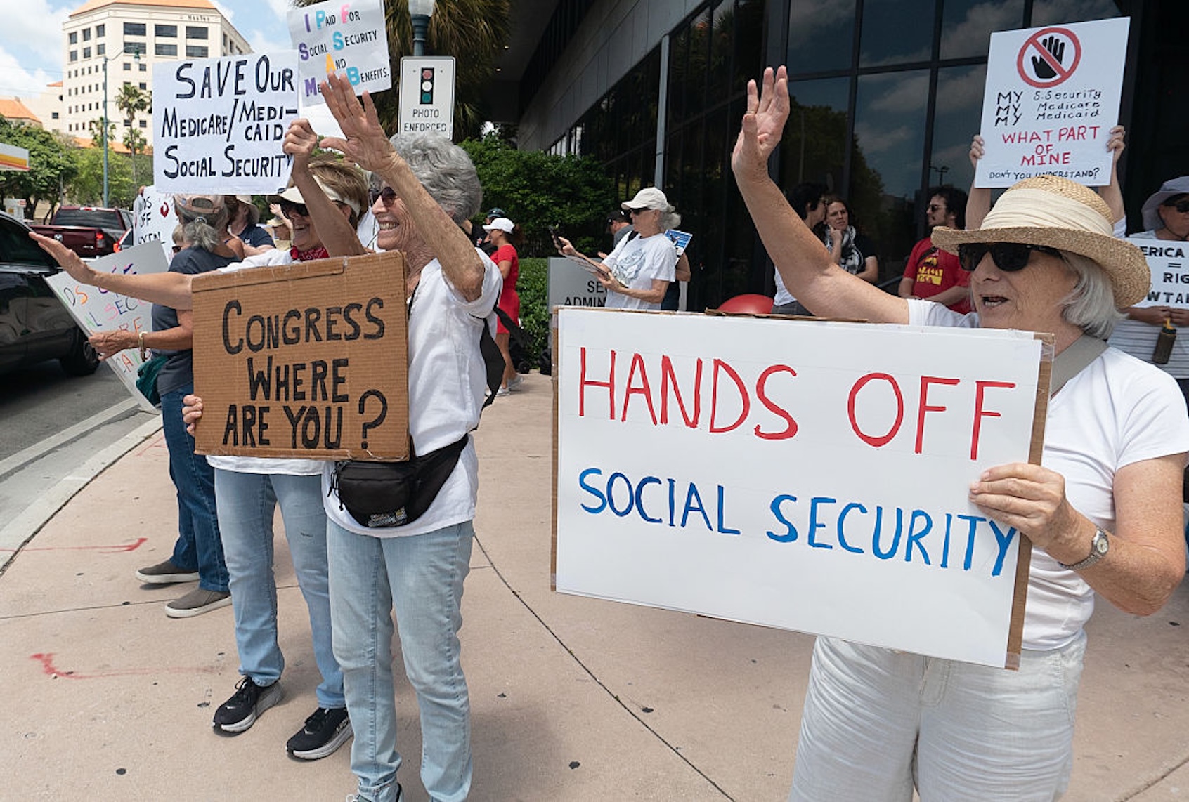 People gather in Miami  to protest social safety net cuts by the Trump administration. (Jesus Olarte/Anadolu via Getty Images)