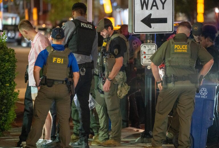 FBI and Border Patrol officers arrest a man, after he threw a sandwich at law enforcement on August 10, 2025 in Washington, DC. (Andrew Leyden/Getty Images)