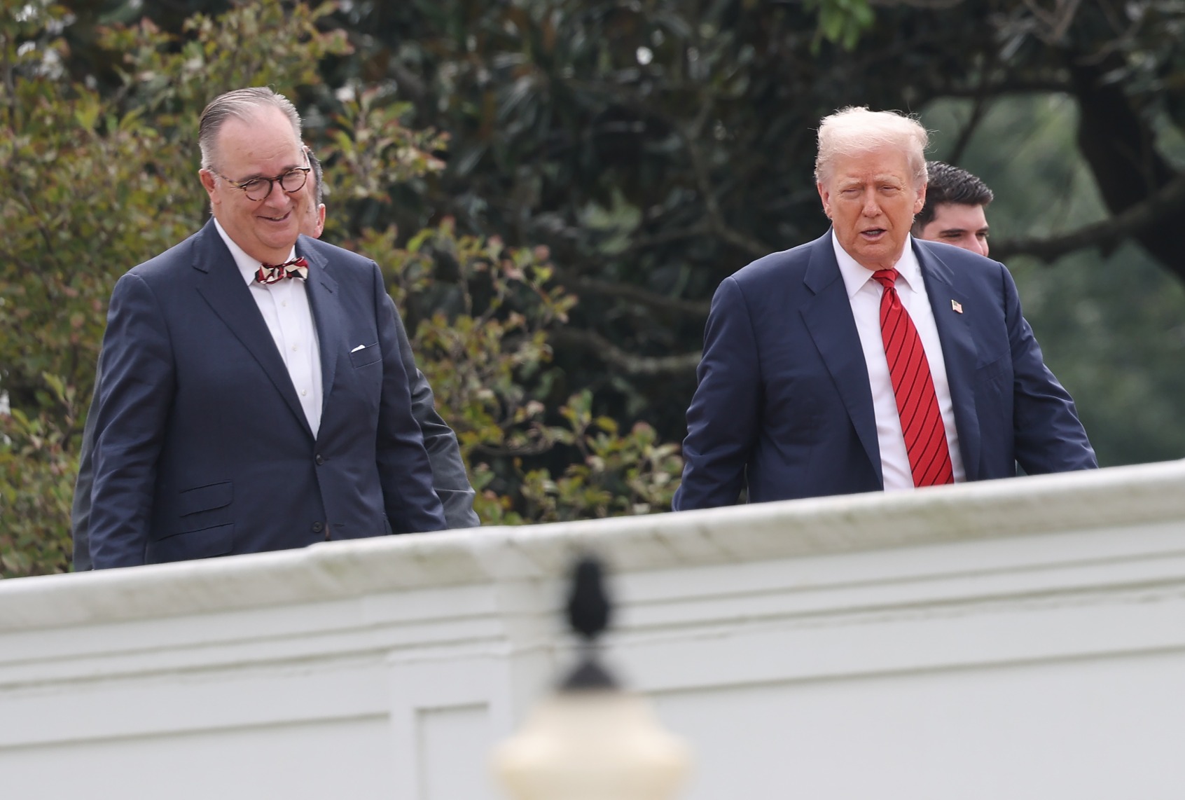President Donald Trump takes a tour of the roof of the West Wing of the White House along with Architect James McCrery (L) on August 05, 2025 in Washington, DC. (Win McNamee/Getty Images)