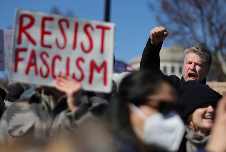 Demonstrators gather at the Capitol Reflecting Pool near the U.S. Capitol in Washington, D.C. on February 17, 2025. (BRYAN DOZIER/Middle East Images/AFP via Getty Images)