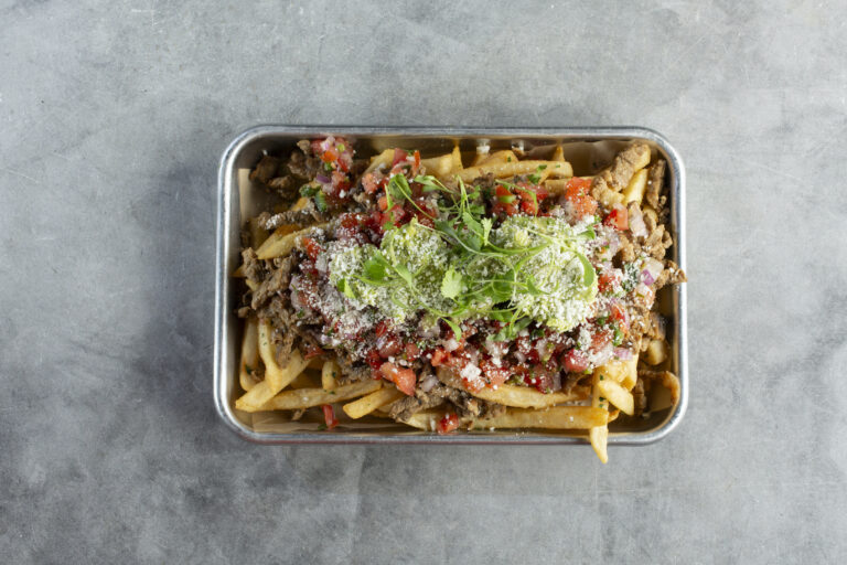 A top down view of a tray of carne asada fries. (Tonelson/Getty Images )