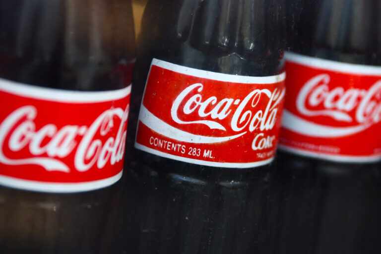 Vintage Coca-Cola bottles are seen in a shop window in Manhattan ( Beata Zawrzel/NurPhoto/Getty Images )