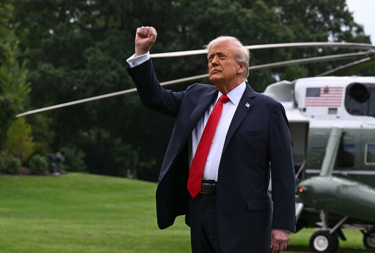 President Donald Trump pumps his fist before boarding Marine One at the White House on Sept. 7, 2025. (Roberto Schmidt/Getty Images)