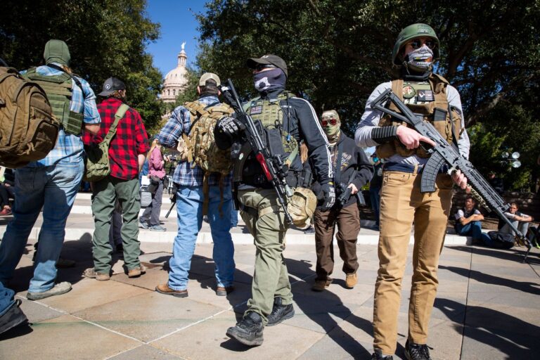 Armed groups hold a rally in front of a closed Texas State Capitol in Austin, Texas,on January 17, 2021 during a nationwide protest called by anti-government and far-right groups supporting US President Donald Trump and his claim of electoral fraud in the November 3 presidential election. The FBI warned authorities in all 50 states to prepare for armed protests at state capitals in the days leading up to the January 20 presidential inauguration of President-elect Joe Biden. ((Photo by MatthePhoto by Matthew Busch/Getty Images)