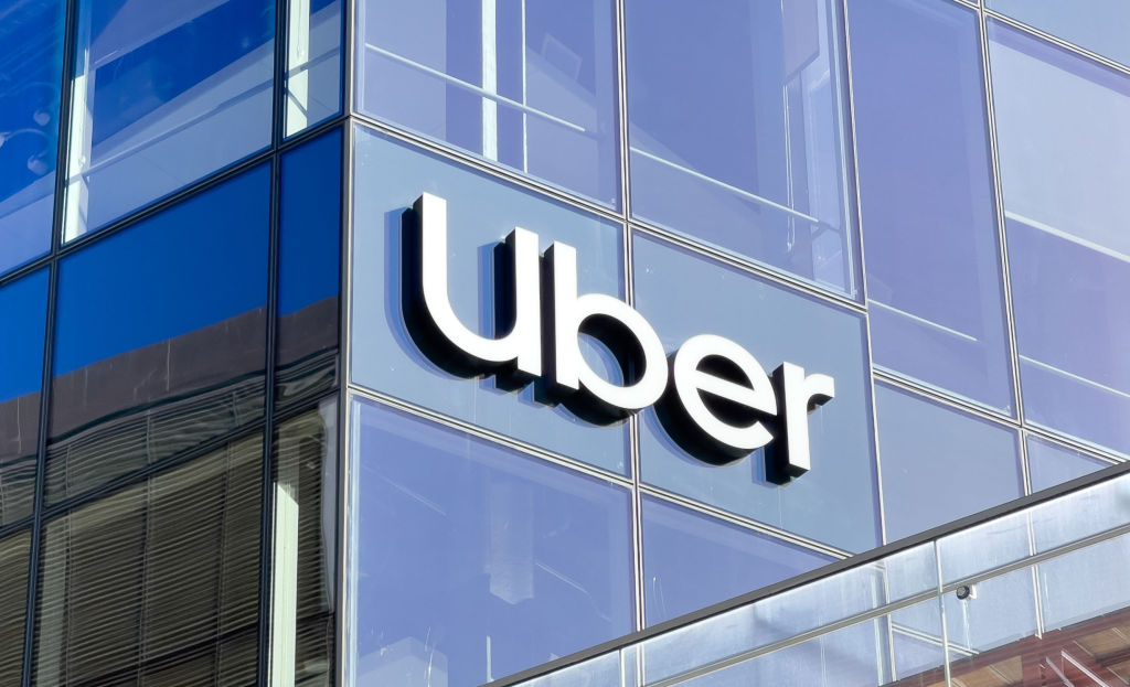 Uber has a history of being sued over its 16 years for safety, pay and other labor issues. DOJ now brings one regarding ADA violations for $125M. (Andrej Sokolow / Getty Images)