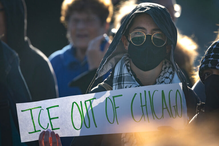 Protests and state leaders push back on the federal deployment of troops into Chicago. Trump touts his dramatic move with an AI-generated online post. (Scott Olson / Getty Images)