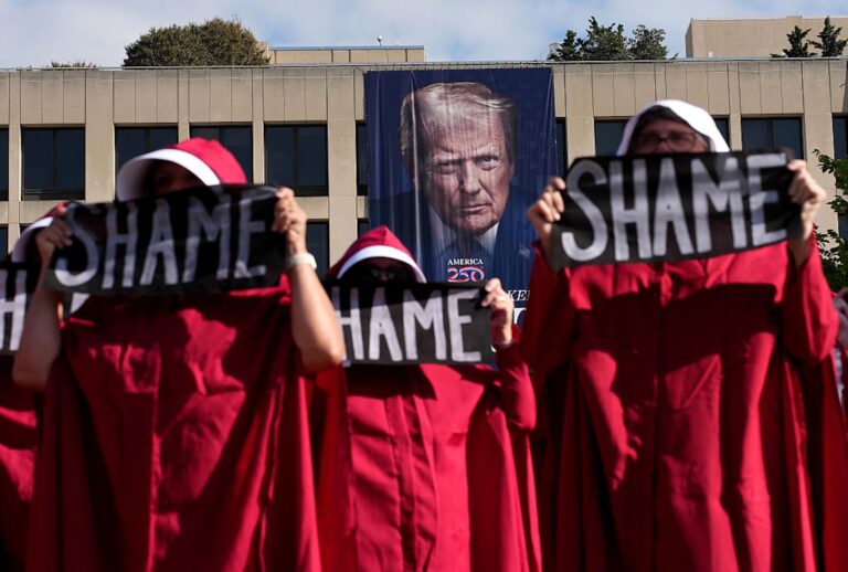 Protesters dressed as handmaids from "The Handmaid's Tale" at the Department of Labor on Sept. 2, 2025. (Kevin Dietsch/Getty Images)