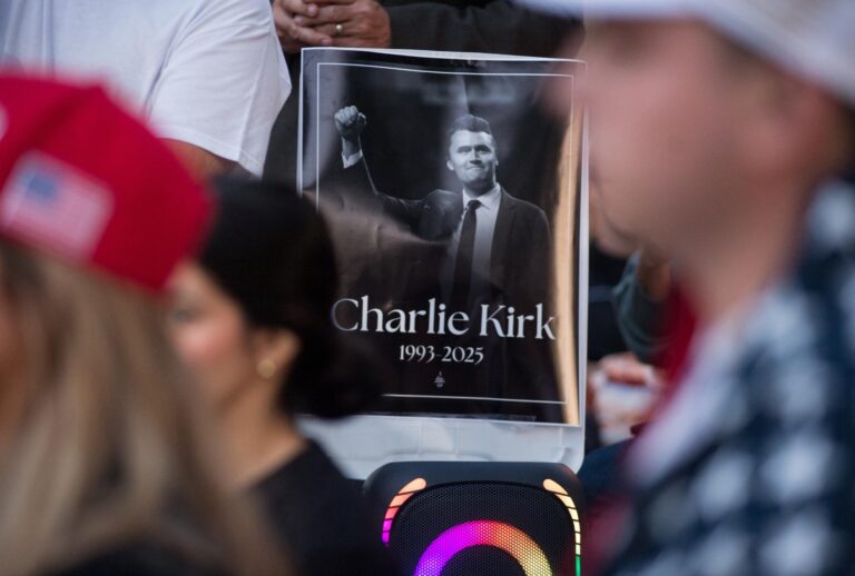 Residents of Lemont, Illinois, pay tribute to Charlie Kirk during a vigil on September 11, 2025. (Jacek Boczarski/Anadolu via Getty Images)