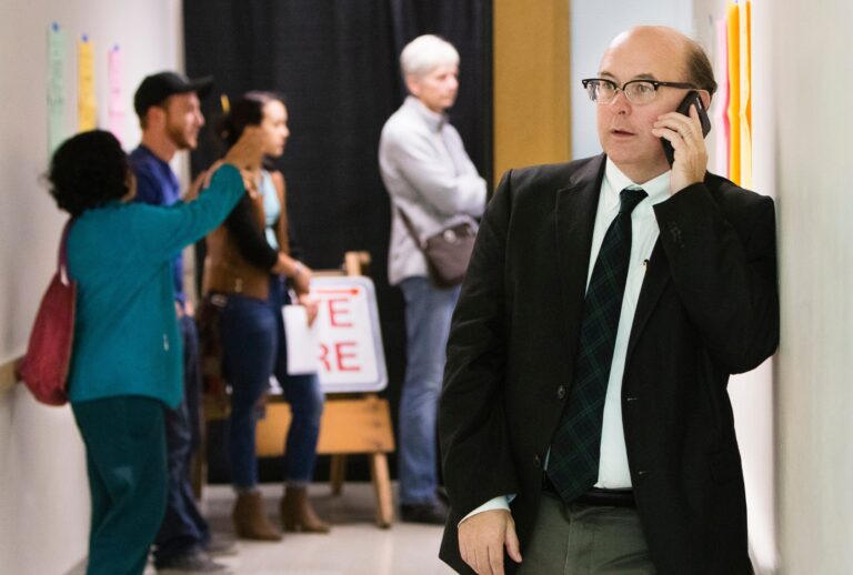 Former Maine Secretary of State Matthew Dunlap fields a phone call at the Merrill Auditorium Rehearsal Hall voting location in Portland on Tuesday, November 8, 2016. (Carl D. Walsh/Portland Portland Press Herald via Getty Images)