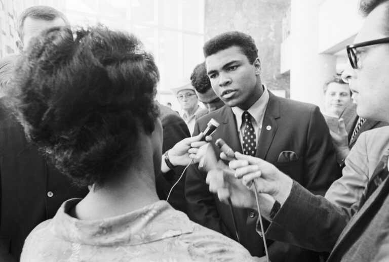 What became of Black celebrity activism? Muhammad Ali speaking with reporters after his 1967 federal indictment for refusing to be inducted into the U.S. armed forces. (Bettmann via Getty Images)