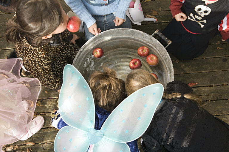 Why do we bob for apples? Children bobbing for apples (Connect Images / Getty Images )
