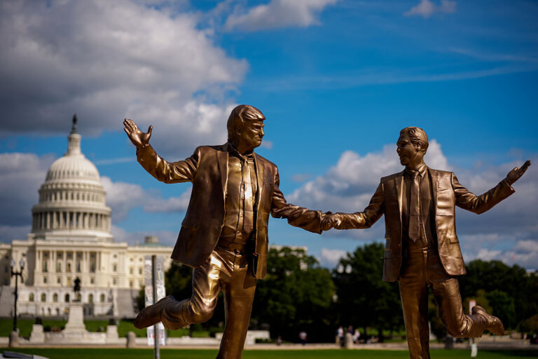 After being removed (and damaged) due to improper permit filing, the bronze stature of Trump and Epstein portray them as "Best Freinds Forever". Is this covered in freedom of public expression? (Andrew Harnik / Getty Images)