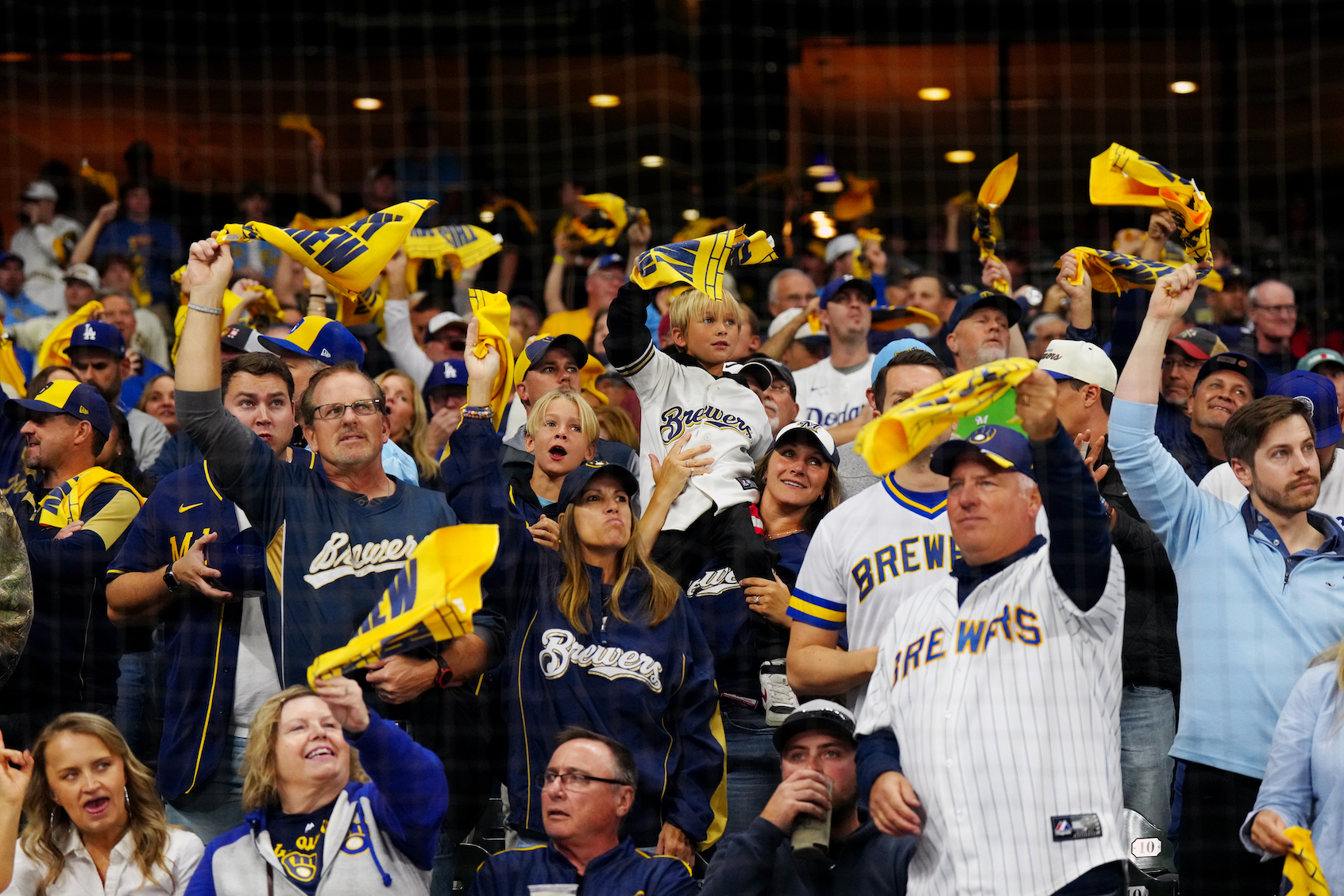 Fans are seen waving rally towels during Game Two of the National League Championship Series between the Los Angeles Dodgers and the Milwaukee Brewers. (Photo by Mary DeCicco/Getty Images)