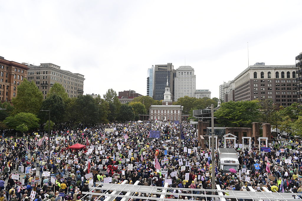 Millions of protesters showed up to rally against "King Trump", like this one at Philadelphia's Independence Hall, the birthplace of the United States. King Trump found his own way to "dump" on the event. (MATTHEW HATCHER / AFP / Getty Images)