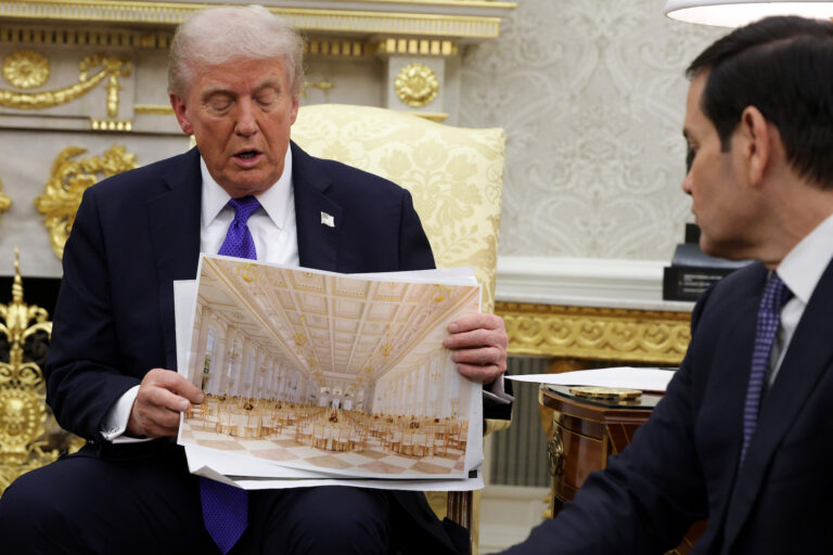 Trump slags East Wing as demo continues U.S. President Donald Trump displays a rendering of his proposed $250 million White House ballroom as he meets with NATO Secretary General Mark Rutte in the Oval Office of the White House on October 22, 2025 in Washington, DC. (Photo by Alex Wong/Getty Images)