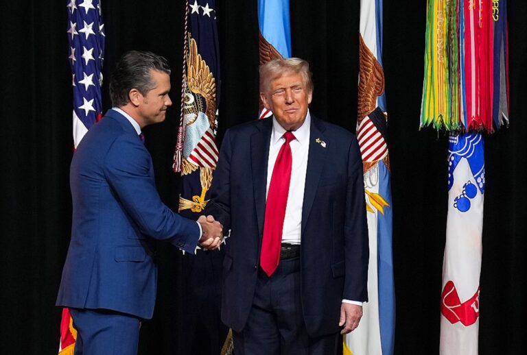 "Warrior culture" invades Chicago President Donald Trump greets Secretary of Defense Pete Hegseth at Marine Corps Base Quantico on Sept. 30, 2025. (Andrew Harnik/Getty Images)