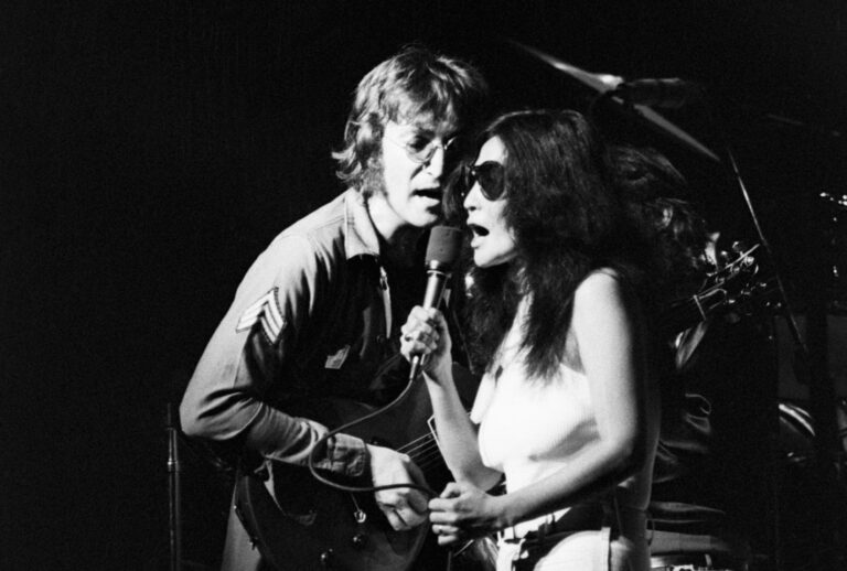 John Lennon and Yoko Ono performing during a concert held at Madison Square Garden in conjunction with a Central Park rally, 1972 (Bettmann/Getty Images)